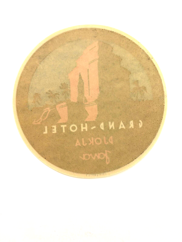 deep red & black vintage luggage label for "grand hotel" djokja, java *